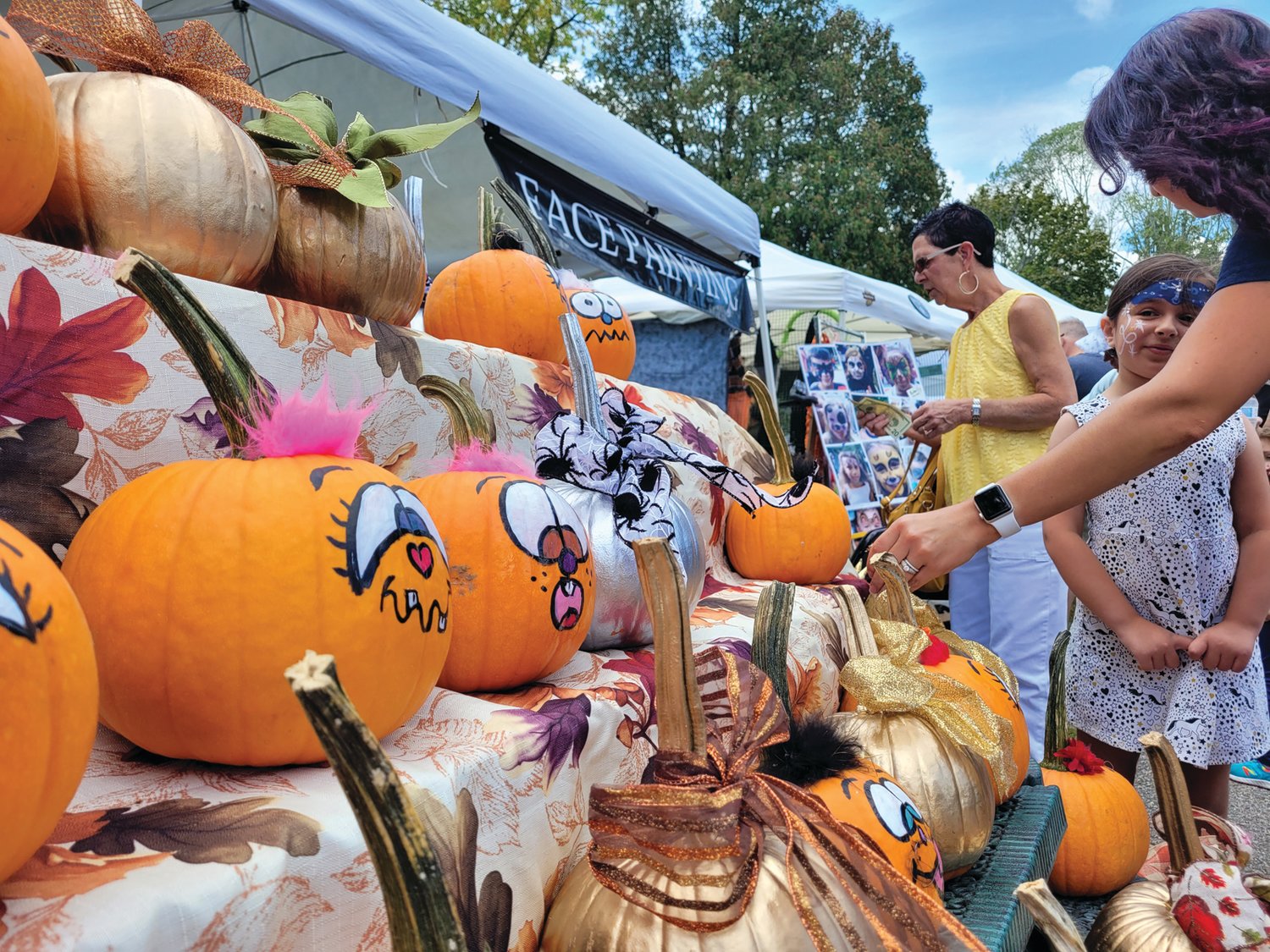 PUMPKIN SPICE: Pumpkins outnumbered apples at last year’s festival. Fall was certainly in the air.